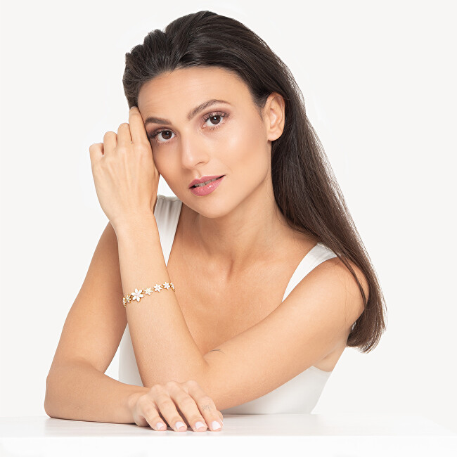 Guess Slušivý pozlacený náramek s květinami White Lotus JUBB04128JWYGWH