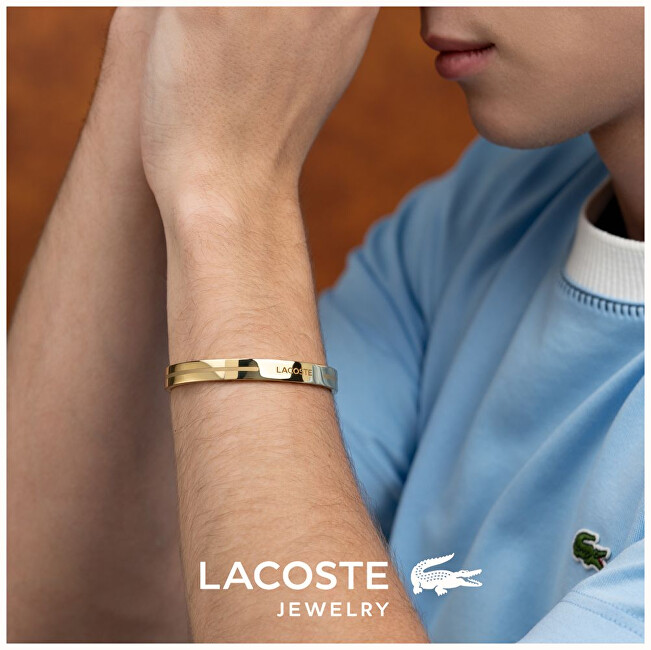 Lacoste Otevřený pevný náramek z pozlacené oceli Adventurer 2040527