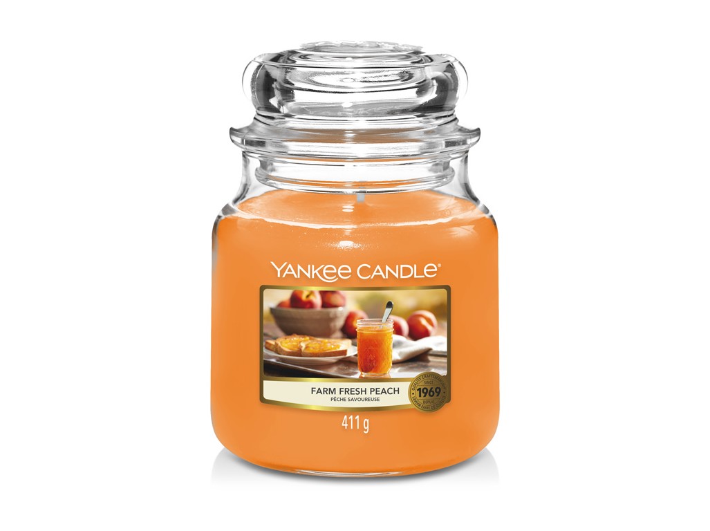 Zobrazit detail výrobku Yankee Candle Aromatická svíčka Classic střední Farm Fresh Peach 411 g