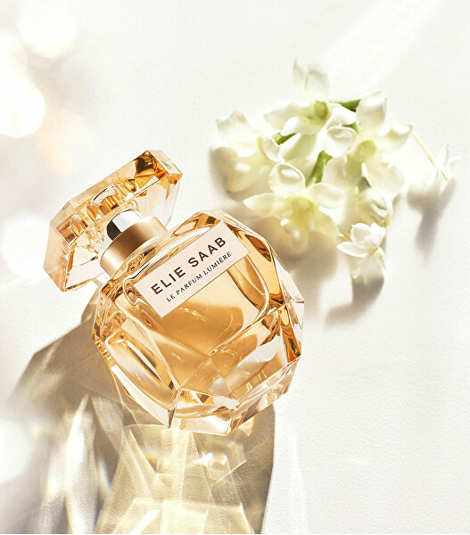 SLEVA - Le Parfum Lumiere - EDP - bez celofánu, chybí cca 3 ml
