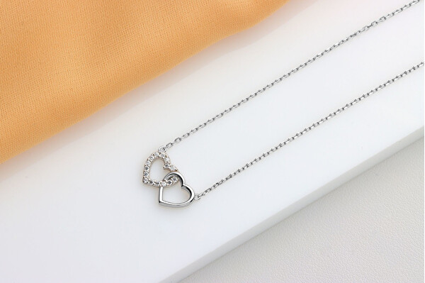 Něžný stříbrný náhrdelník Propojená srdce NCL117W